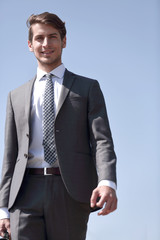 close up.confident businessman stepping forward.