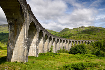 Arched columns of curving Glenfinnan Viaduct for West Highland Line train Lochaber Scottish Highlands Scotland United Kingdom