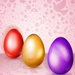 Three colored Easter eggs standing on pink background of flowers, cakes, hare, chicken and other holiday symbols