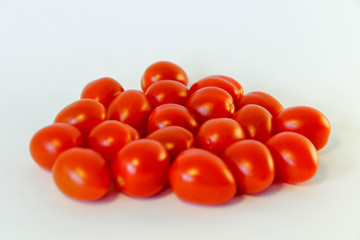 Fresh red tomatoes isolated on the white background