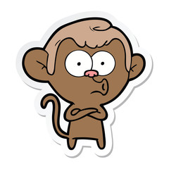 sticker of a cartoon hooting monkey