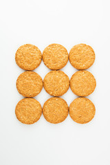Oatmeal cookie isolated on white. Healthy round cookies.
