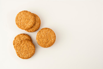 Oatmeal cookie isolated on white. Healthy round cookies.