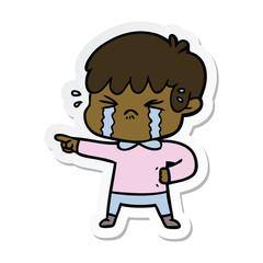 sticker of a crying boy cartoon