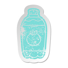 distressed old sticker of orange pop