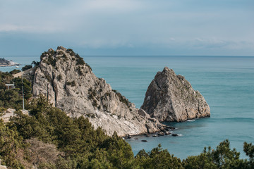 Rock Diva on beach, beautiful black sea shore landscape with mountain cliff, main nature landmark in Crimean Simeiz village resort for vacation
