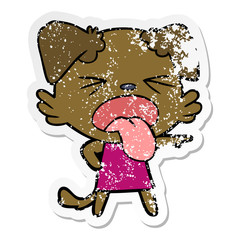 distressed sticker of a cartoon disgusted dog
