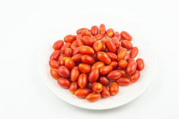 cherry tomato fruit isolated on white dish