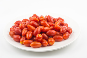 cherry tomato fruit isolated on white dish