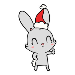 Fototapeta na wymiar cute line drawing of a rabbit wearing santa hat