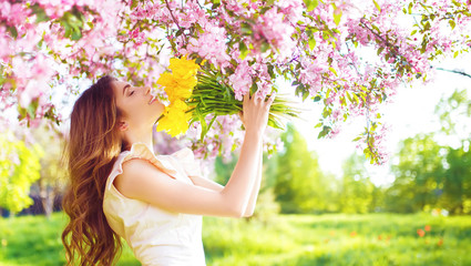 Beauty Portrait of Beautiful Young Brunette Woman In Nice Spring Dress With A Bouquet Of...