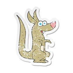 retro distressed sticker of a cartoon kangaroo