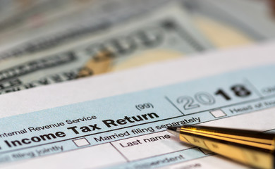 tax return forms with money