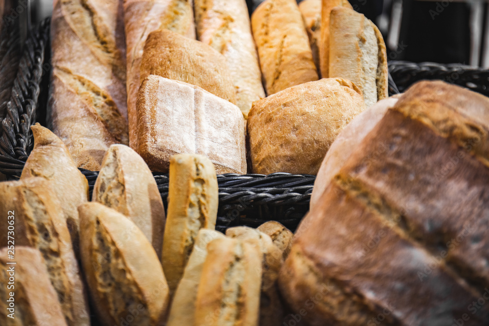 Wall mural homemade detail of breads cooked in wood-fired oven as formerly yummy. delicious large breads packed