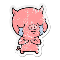 distressed sticker of a cartoon pig crying