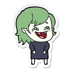 sticker of a cartoon laughing vampire girl