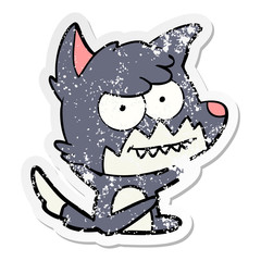 distressed sticker of a cartoon grinning fox