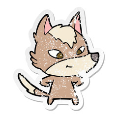 distressed sticker of a friendly cartoon wolf