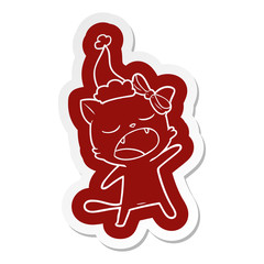 cartoon  sticker of a singing cat wearing santa hat