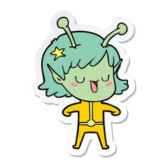 sticker of a happy alien girl cartoon