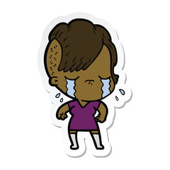 sticker of a cartoon crying girl
