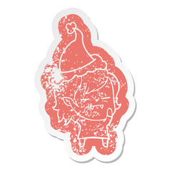 cartoon distressed sticker of a undead vampire girl wearing santa hat