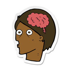 sticker of a cartoon head with brain symbol