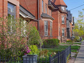 street with large old Victorian houses