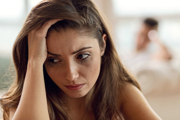 Young woman feeling depressed while having problems in her relationship.