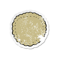 distressed sticker of a cartoon biscuit
