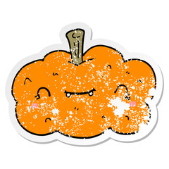distressed sticker of a cartoon pumpkin