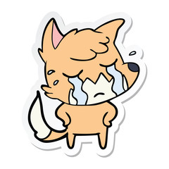 sticker of a crying fox cartoon