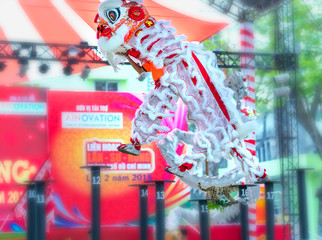 Ho Chi Minh City, Vietnam - December 30th, 2018: Lion dancing competition performing arts welcome new year by Tourism Department of city held 2nd attract visitors to cheer in Ho Chi Minh city, Vietnam