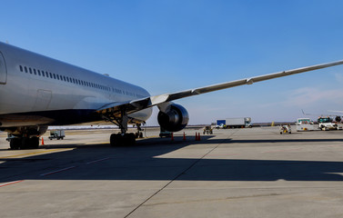 jet engine against a plane at the airport on loading