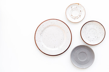 Mockup with plates. Empty ceramic plates on white background top view space for text