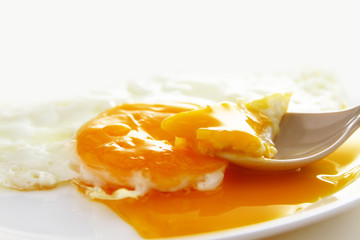 Egg background / chicken egg yolk is a major source of vitamins and minerals. It contains all of the egg's fat and cholesterol, and nearly half of the protein
