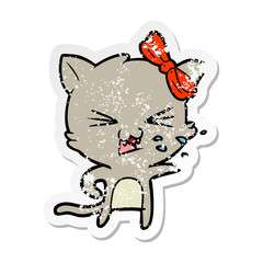 distressed sticker of a cartoon cat