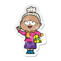 distressed sticker of a cartoon happy old lady