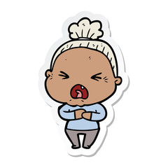 sticker of a cartoon angry old woman