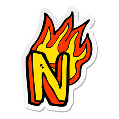 sticker of a cartoon flaming letter