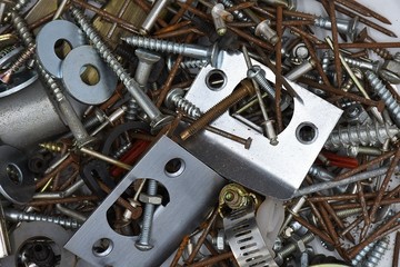 Abstract mixed hardware and fittings closeup background