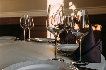 graceful wine glasses on the table in the restaurant