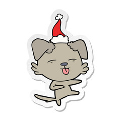 sticker cartoon of a dog dancing wearing santa hat