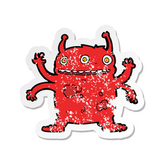 retro distressed sticker of a cartoon alien monster