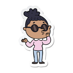sticker of a cartoon woman wearing sunglasses