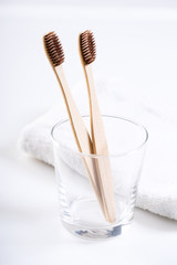 Fototapeta na wymiar bamboo toothbrushes in glass