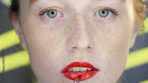 Close Up Of Female Face With Freckles And Green Eyes Young