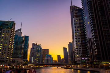 Dubai, UAE - November 29, 2018: High-rise houses of modern futuristic design of Dubai Marina district.