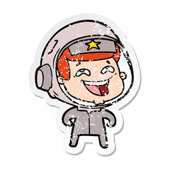 distressed sticker of a cartoon laughing astronaut