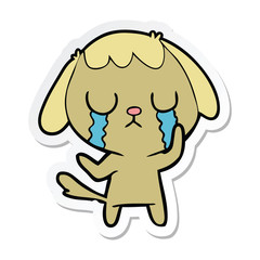 sticker of a cute cartoon dog crying